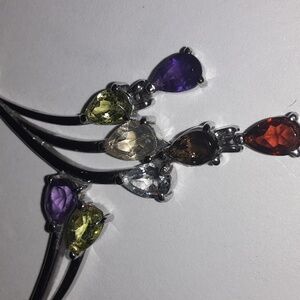 PRICE DROP!Genuine  multi gemstone necklace in stainless steel.  Magnetic clasp.
